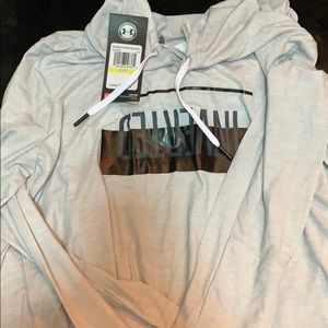 Under armour womans athletic top with hood.